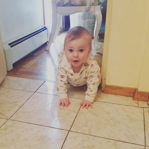 Baby crawling into bathroom invading mom's privacy.